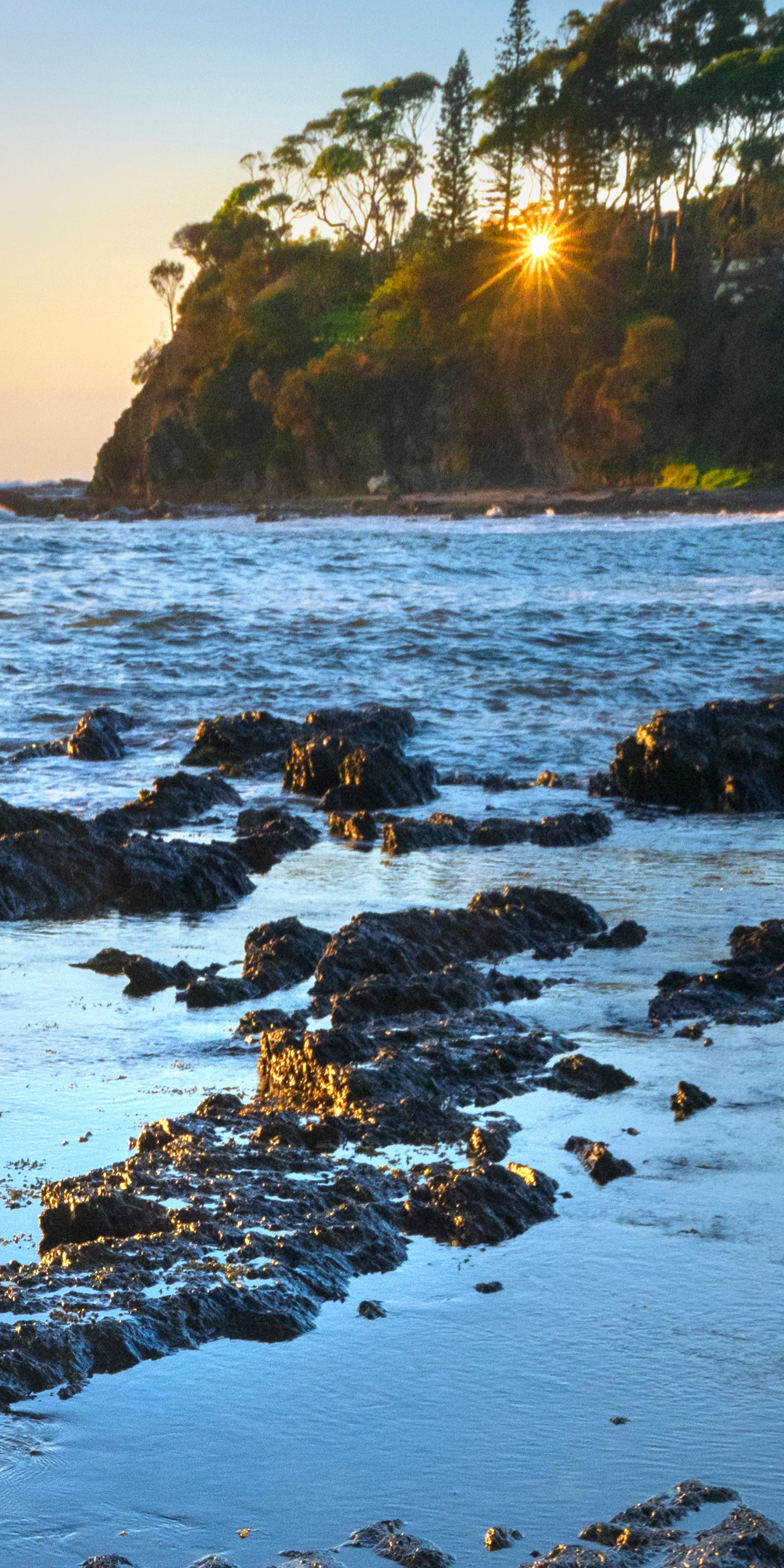Sunrise Glow on Pebbles