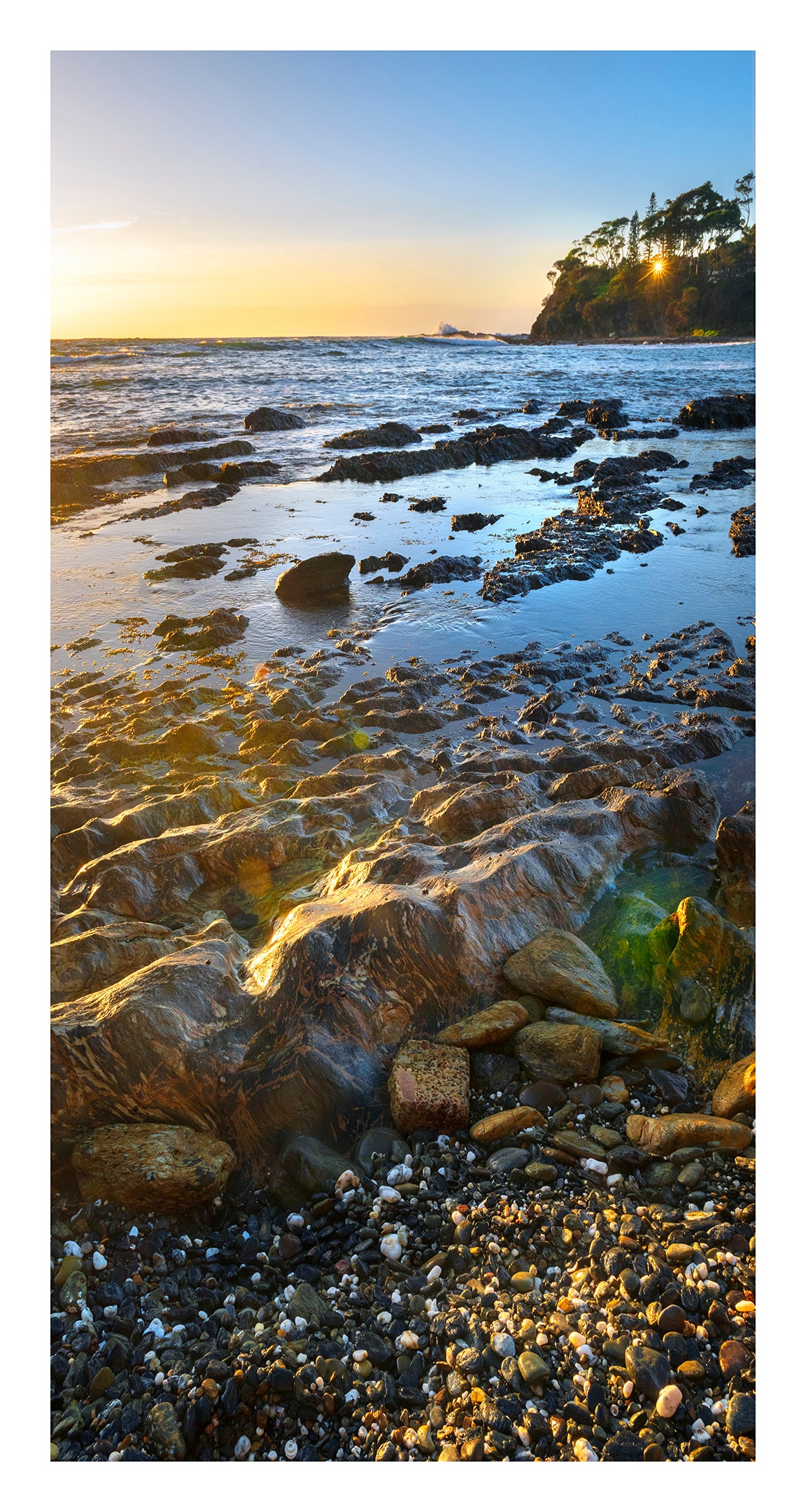 Sunrise Glow on Pebbles