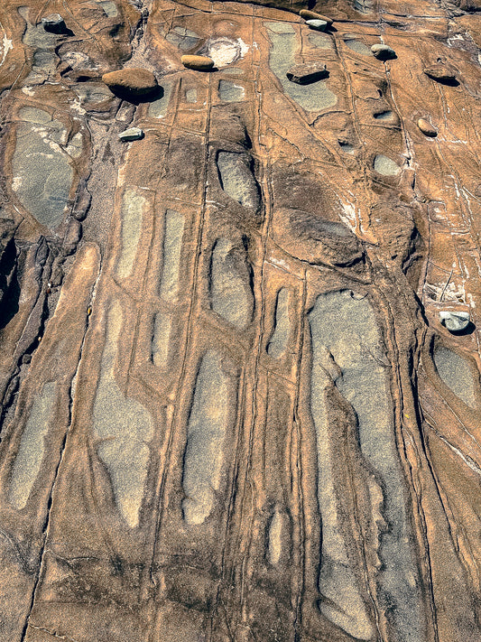 Tides Etched in Stone