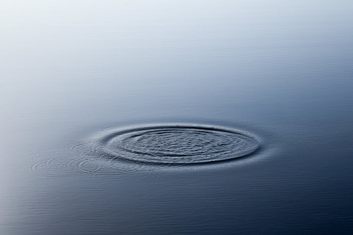 Ripples on a flat watery surface