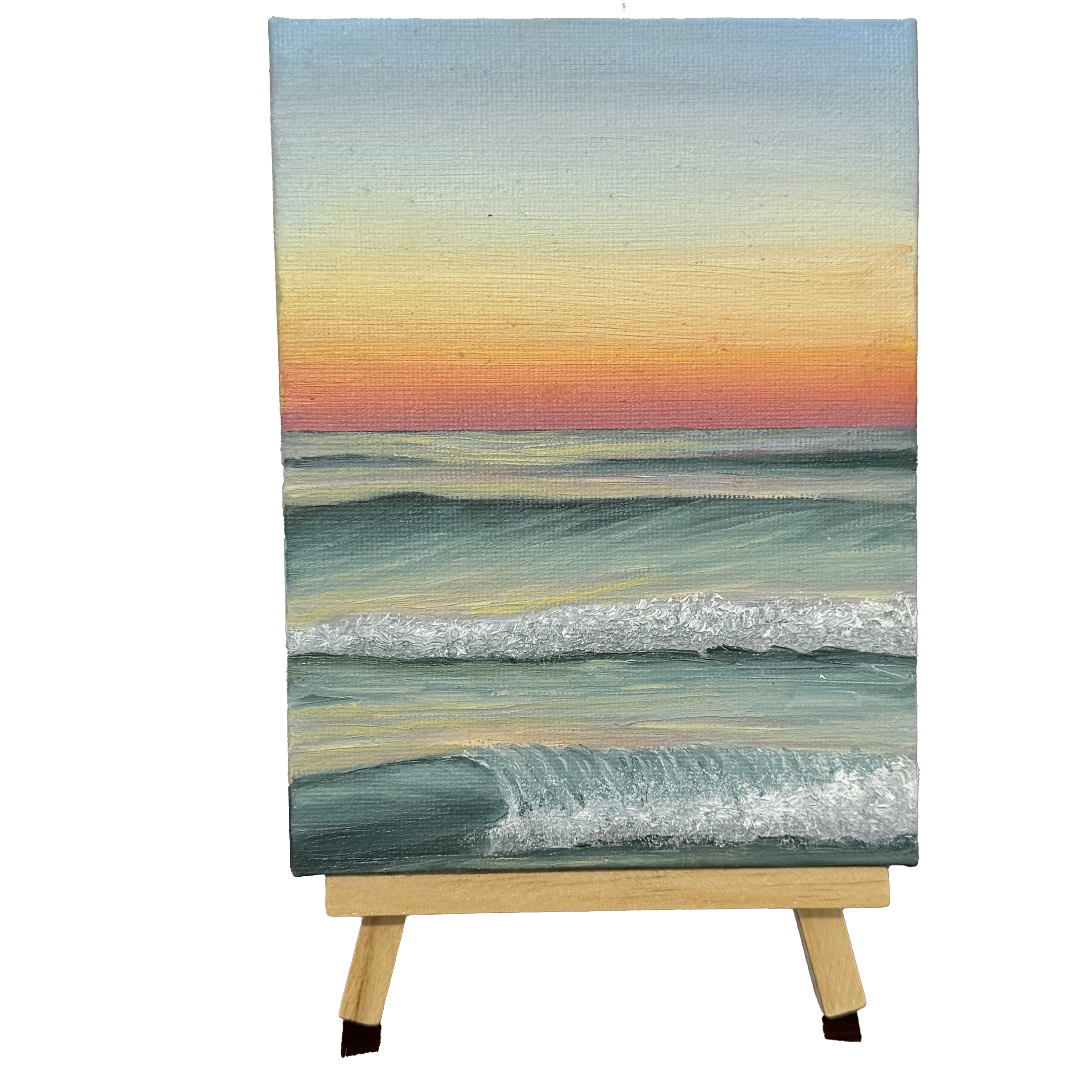 Oil painting of an ocean at sunset on a wooden stand