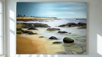 Beach scene painting on a wall with natural light